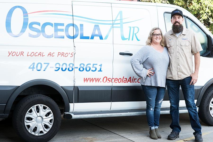Osceola Team In Front Of Van