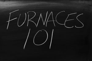 Furnaces 101 written on a chalkboard